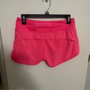 Hot pink Lululemon speed up shorts